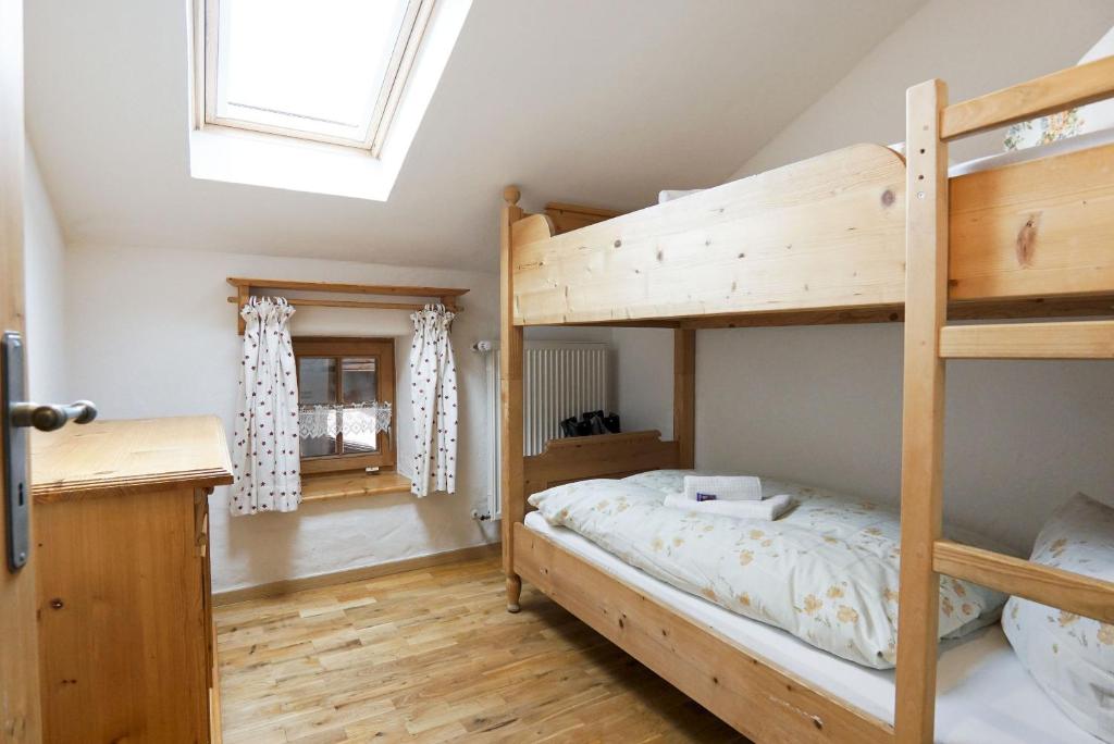 Postel nebo postele na pokoji v ubytování Feriengut zum Fürst`n mit Außenwhirlpool und Sauna