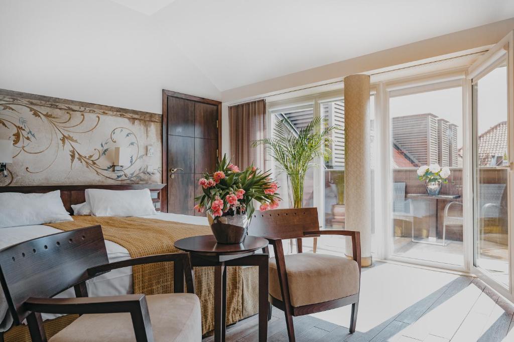 Posezení v ubytování Mamaison Le Regina Boutique Hotel