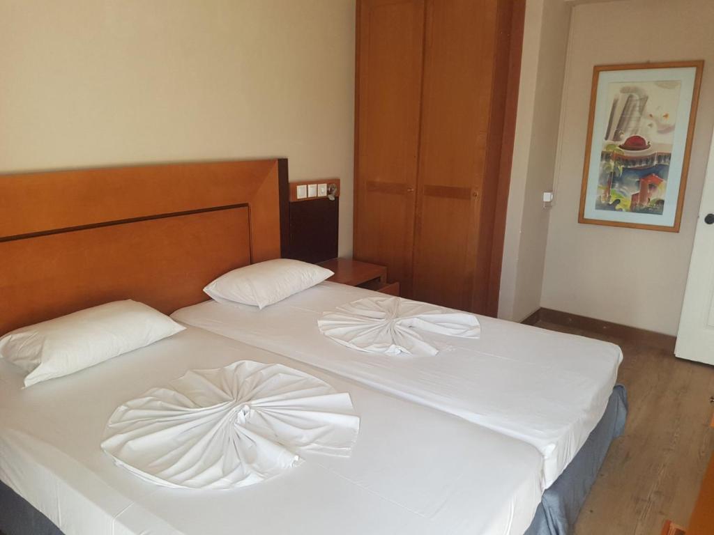 Postel nebo postele na pokoji v ubytování Bristol Apartments