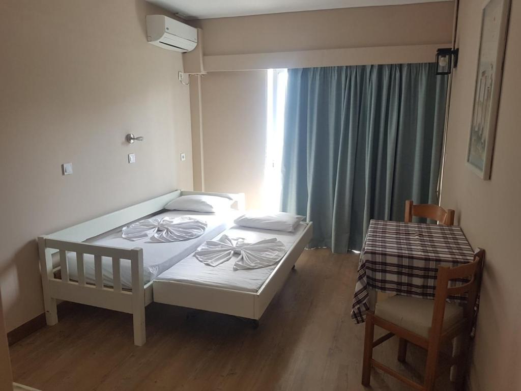 Postel nebo postele na pokoji v ubytování Bristol Apartments
