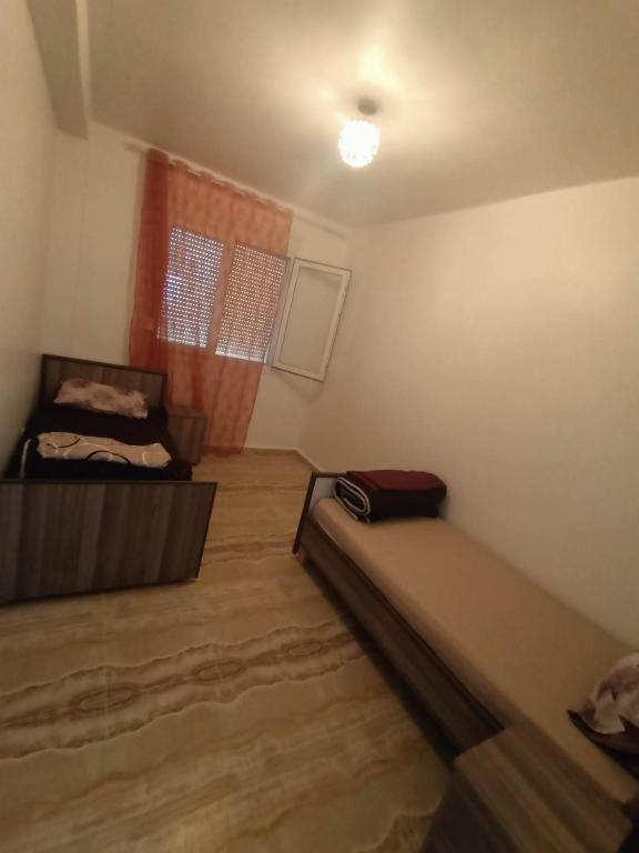Un ou plusieurs lits dans un hébergement de l'établissement BEJAIA Location Appartements de 49 à 59eur