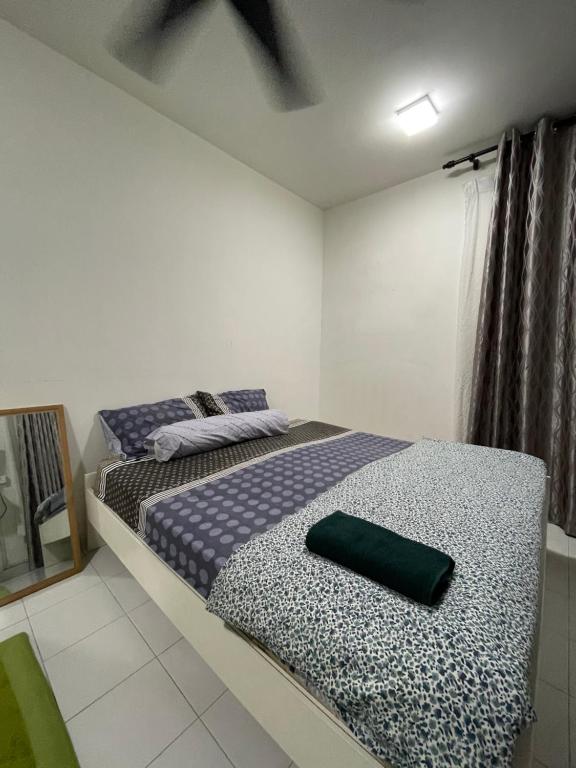 Katil atau katil-katil dalam bilik di Homestay Putrajaya