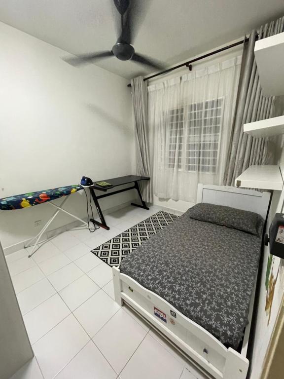 Katil atau katil-katil dalam bilik di Homestay Putrajaya