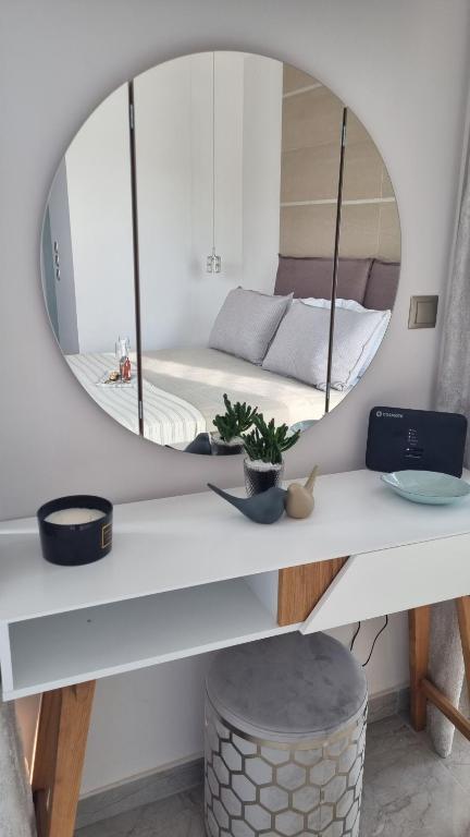 Postel nebo postele na pokoji v ubytování SM Luxury Penthouse Corfu