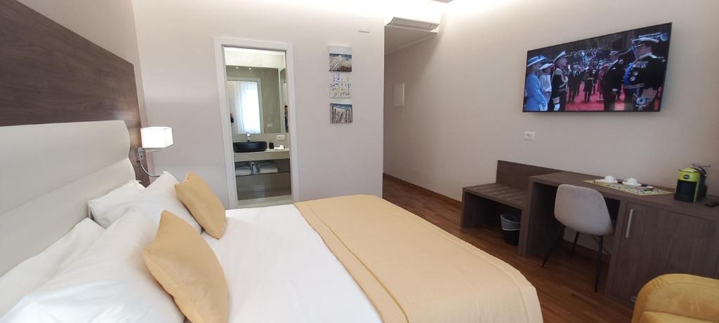 Postel nebo postele na pokoji v ubytování Orchid Luxury Suite