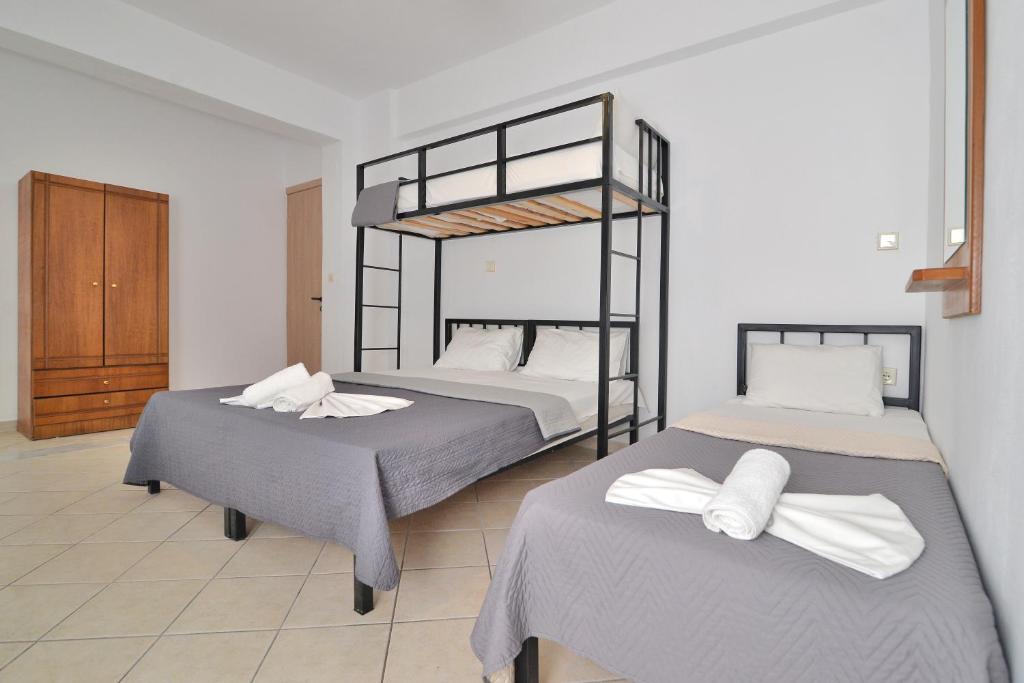 Postel nebo postele na pokoji v ubytování Apartments Kalina