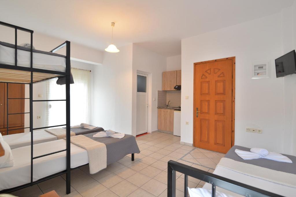 Postel nebo postele na pokoji v ubytování Apartments Kalina