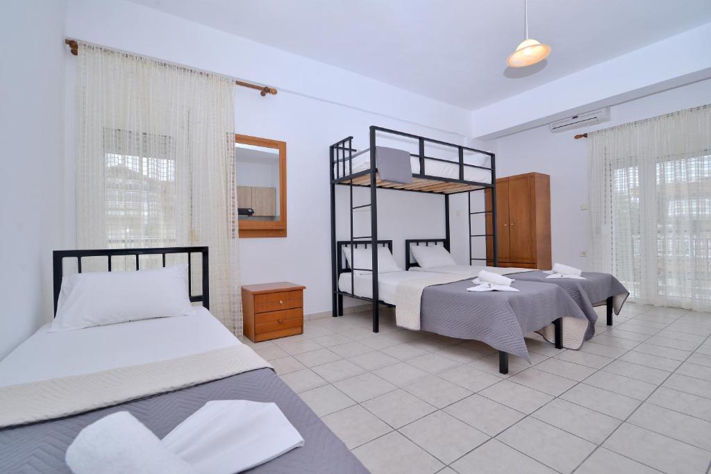 Postel nebo postele na pokoji v ubytování Apartments Kalina