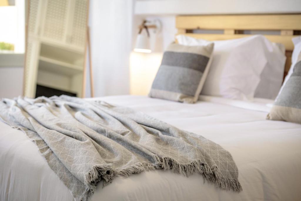 Letto o letti in una camera di Geminos Complex Villas