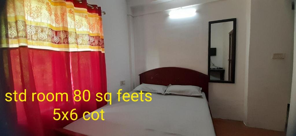 Postel nebo postele na pokoji v ubytování Durga budget stay