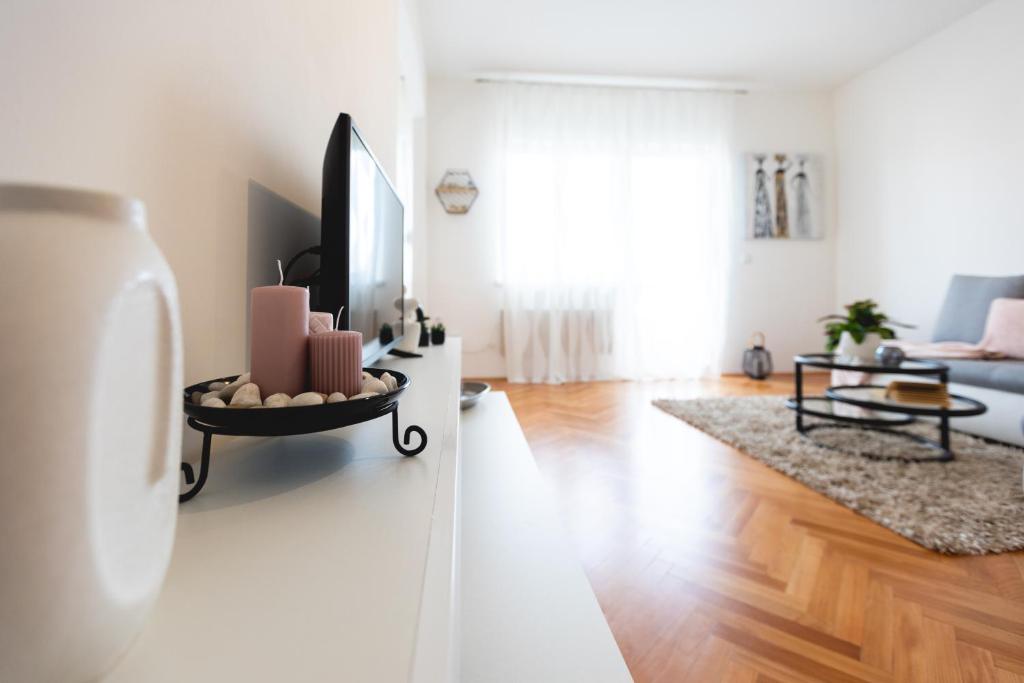 TV a/nebo společenská místnost v ubytování Apartments Come&Stay
