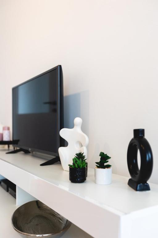 TV a/nebo společenská místnost v ubytování Apartments Come&Stay