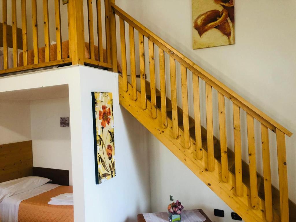 Postel nebo postele na pokoji v ubytování Agriturismo Valle di Chiaramonte