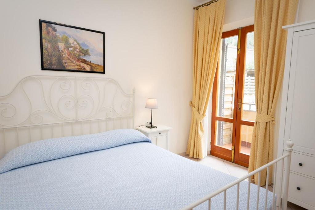 Кровать или кровати в номере Hotel Anna