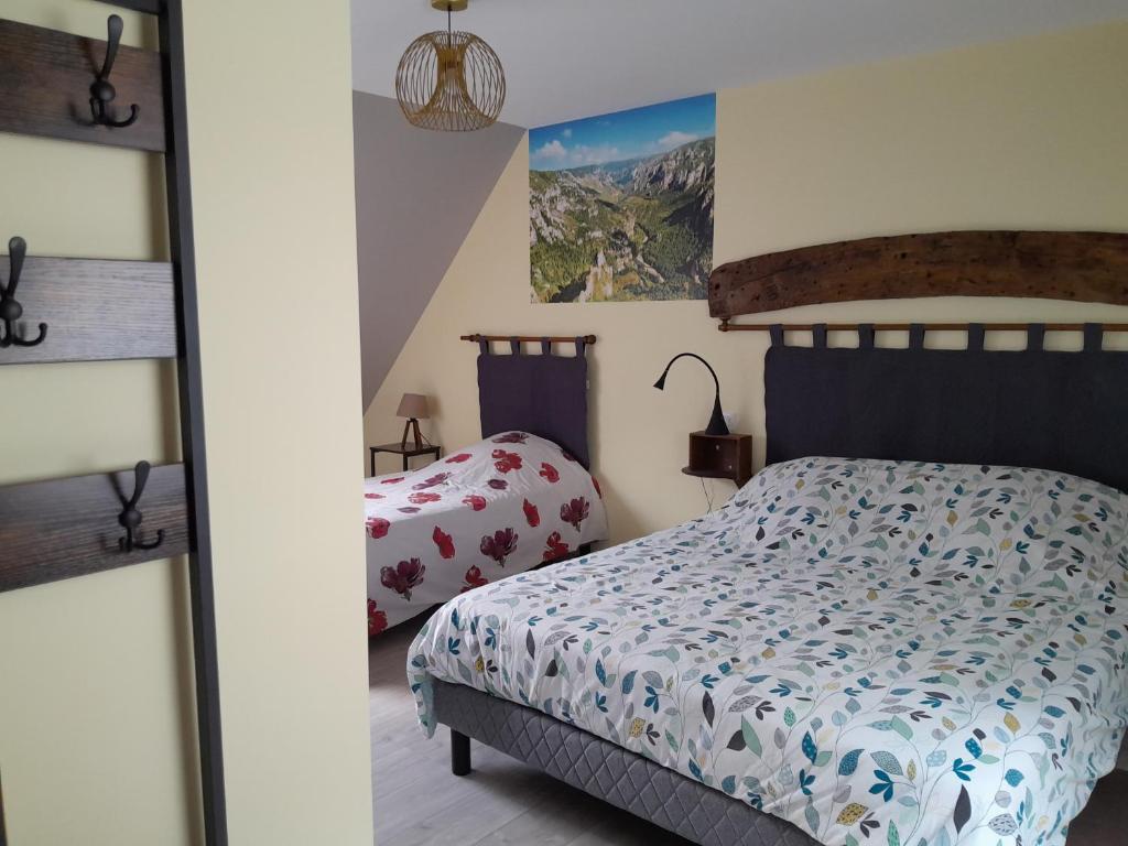 Postel nebo postele na pokoji v ubytování Chambre d'hôtes Le Cascadou