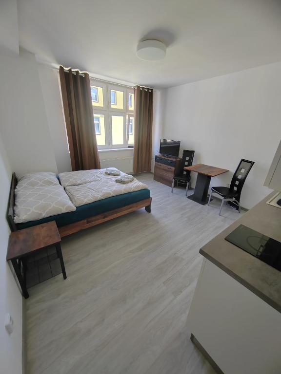 Postel nebo postele na pokoji v ubytování Skořepka15 apartment Brno-střed