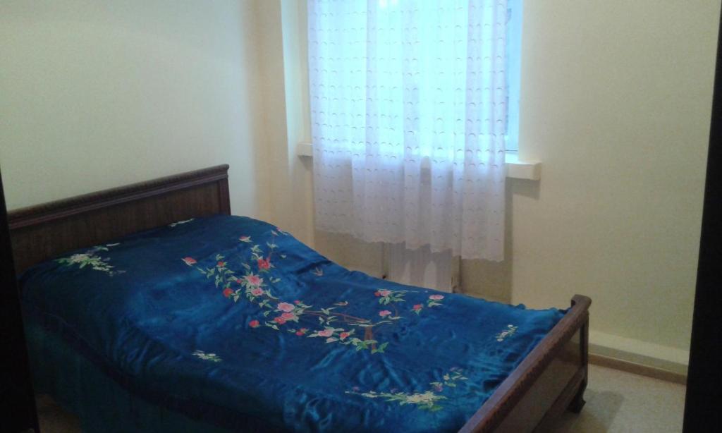Postel nebo postele na pokoji v ubytování Lemon Family GuestHouse