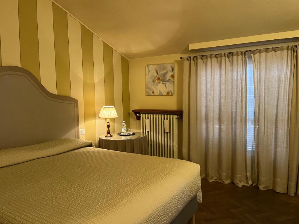 Voodi või voodid majutusasutuse B&B Artincentro toas