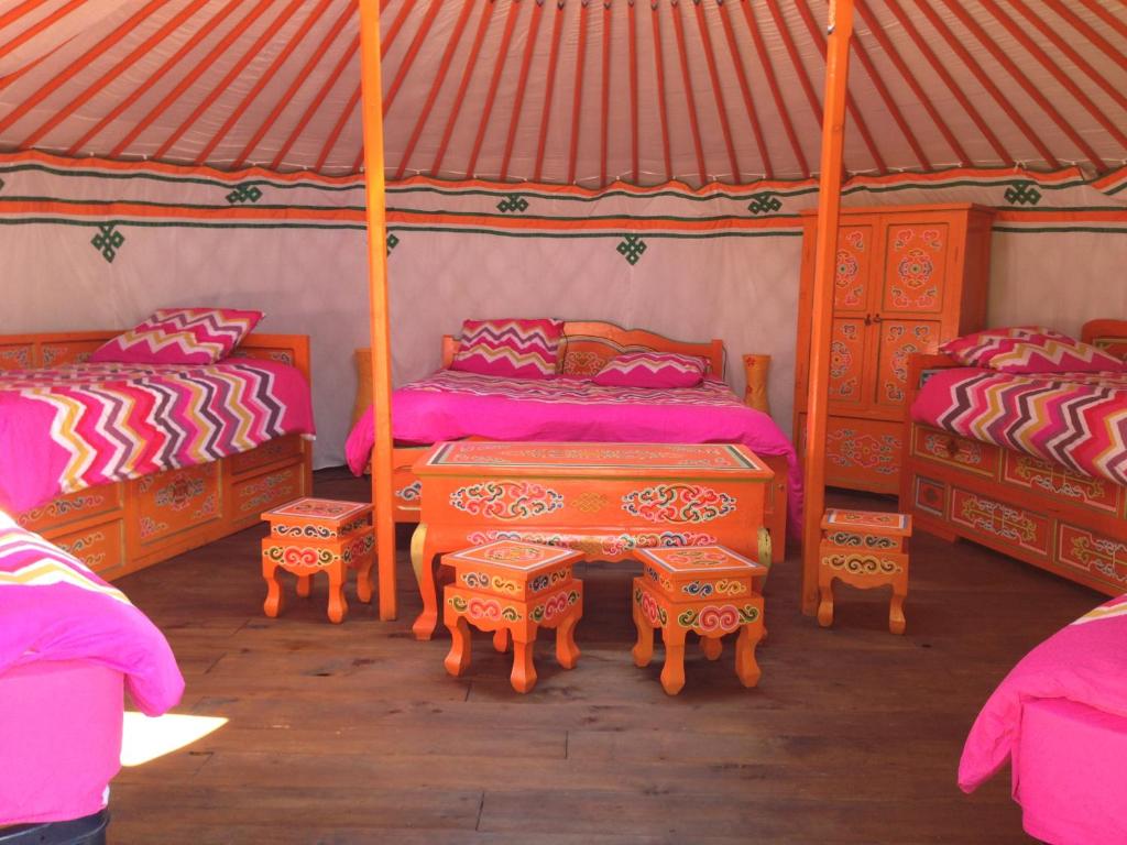 Postel nebo postele na pokoji v ubytování Camping Domaine de Mepillat