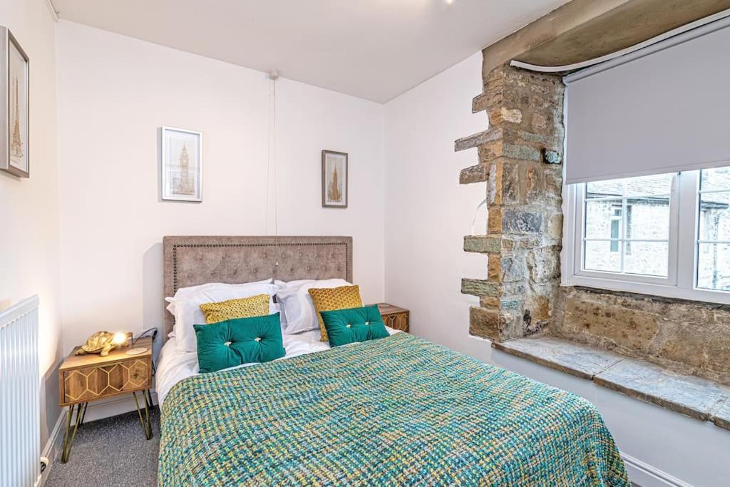 Ένα ή περισσότερα κρεβάτια σε δωμάτιο στο Harestones - Bridge End Mill