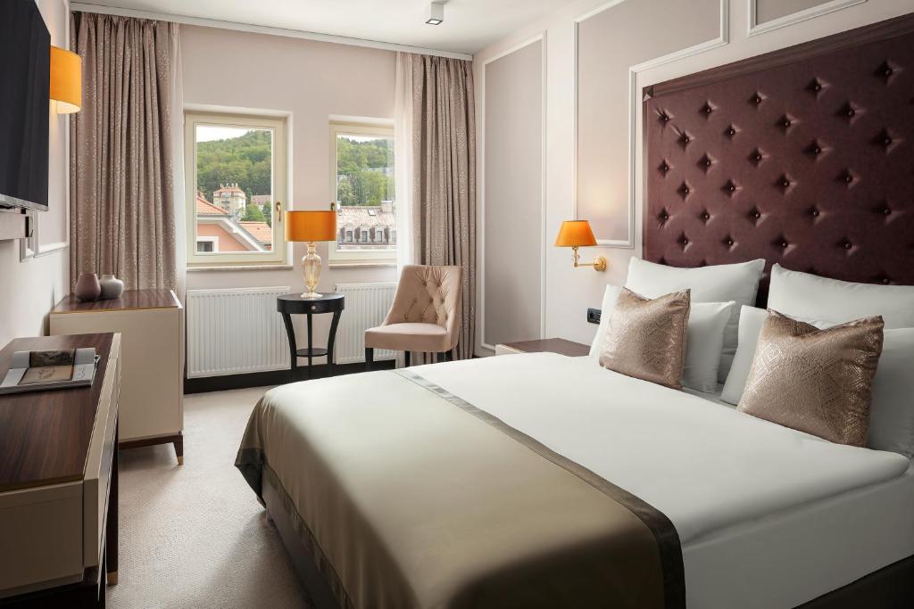 Postel nebo postele na pokoji v ubytování Boutique Hotel Saxonia
