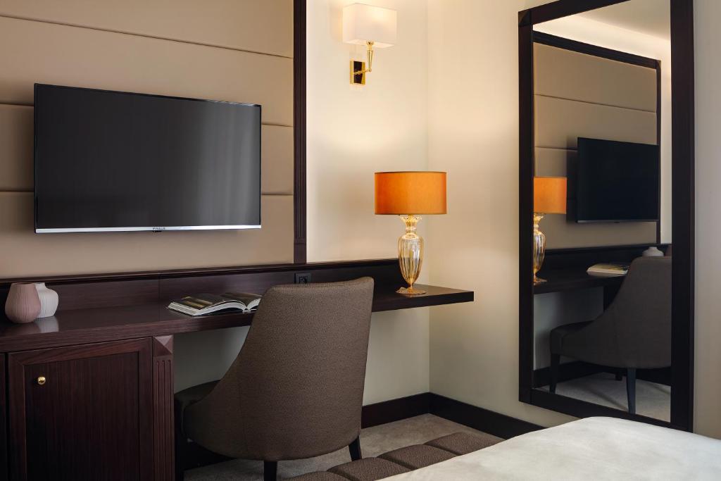 TV a/nebo společenská místnost v ubytování Boutique Hotel Saxonia