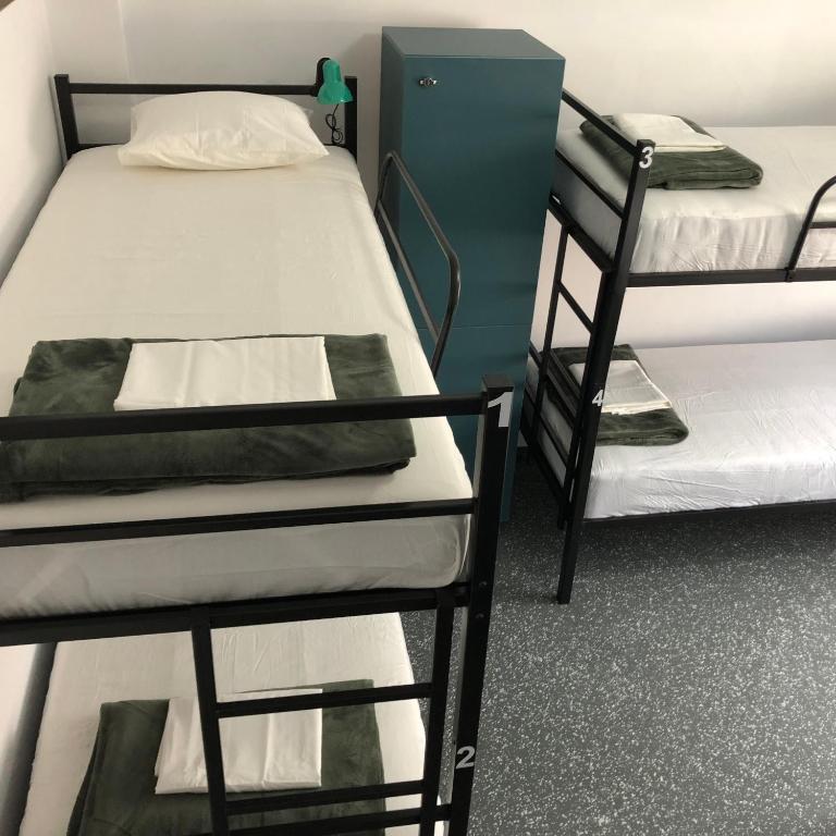 Postel nebo postele na pokoji v ubytování Bedsy