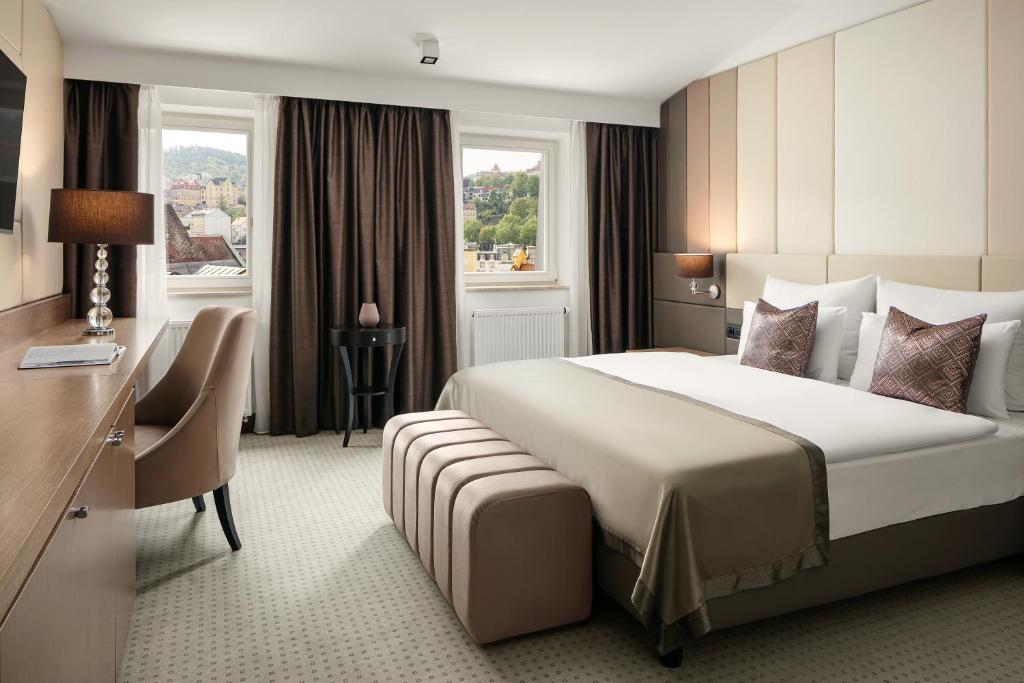 Postel nebo postele na pokoji v ubytování Boutique Hotel Saxonia