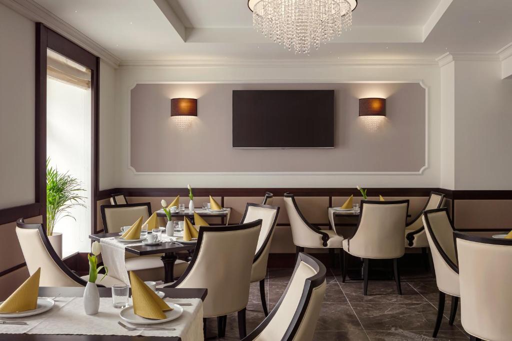 TV a/nebo společenská místnost v ubytování Boutique Hotel Saxonia