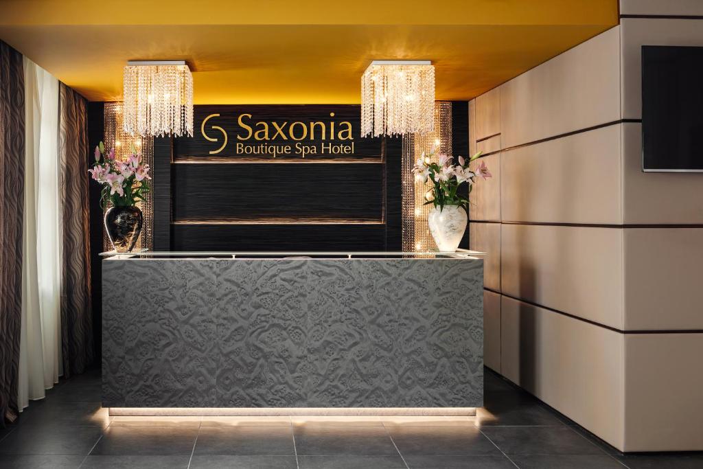 Certifikát, hodnocení, plakát nebo jiný dokument vystavený v ubytování Boutique Hotel Saxonia