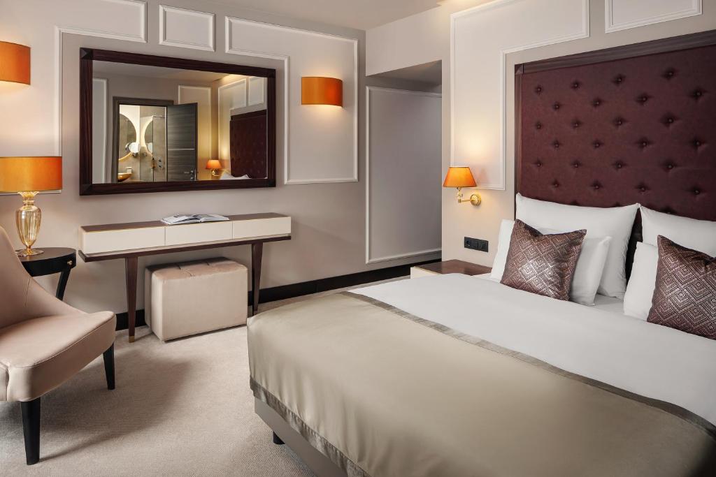 Postel nebo postele na pokoji v ubytování Boutique Hotel Saxonia