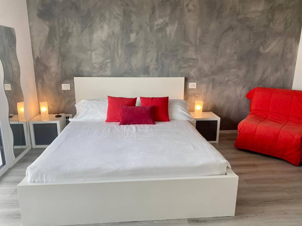 Łóżko lub łóżka w pokoju w obiekcie Villa Carlotta