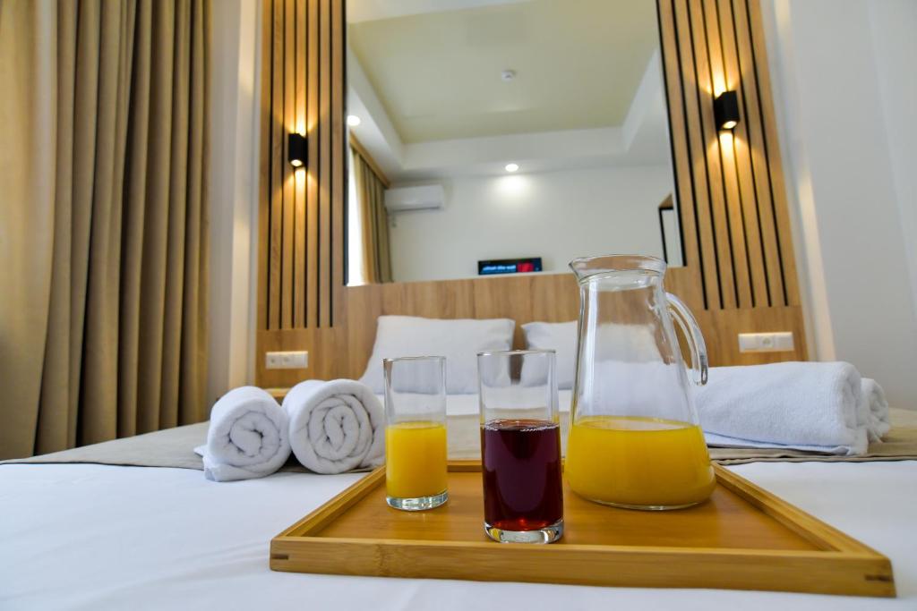 Postel nebo postele na pokoji v ubytování Euro Hotel Kutaisi