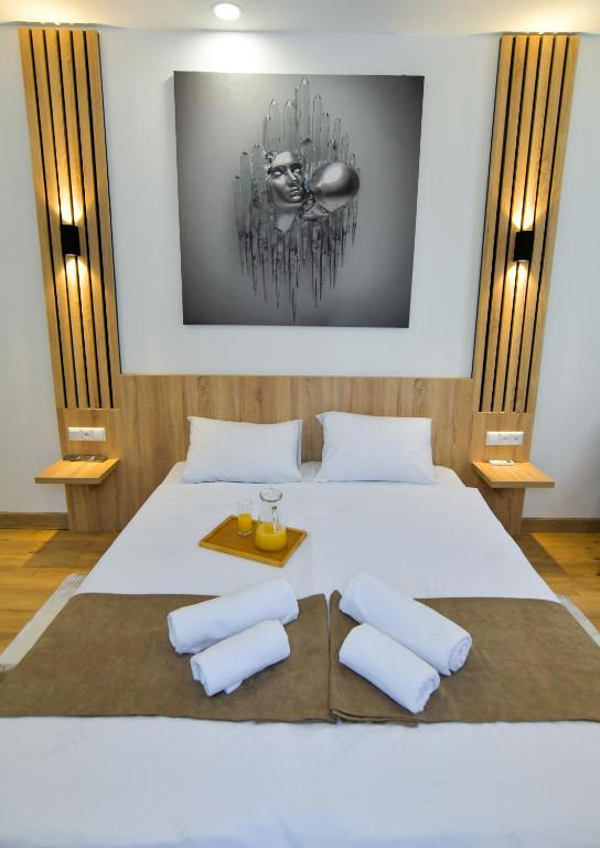 Postel nebo postele na pokoji v ubytování Euro Hotel Kutaisi
