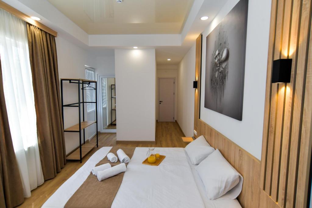 Postel nebo postele na pokoji v ubytování Euro Hotel Kutaisi