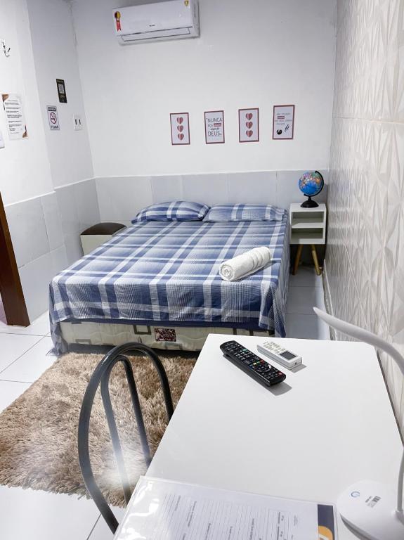 Postel nebo postele na pokoji v ubytování Residencial Napolitan