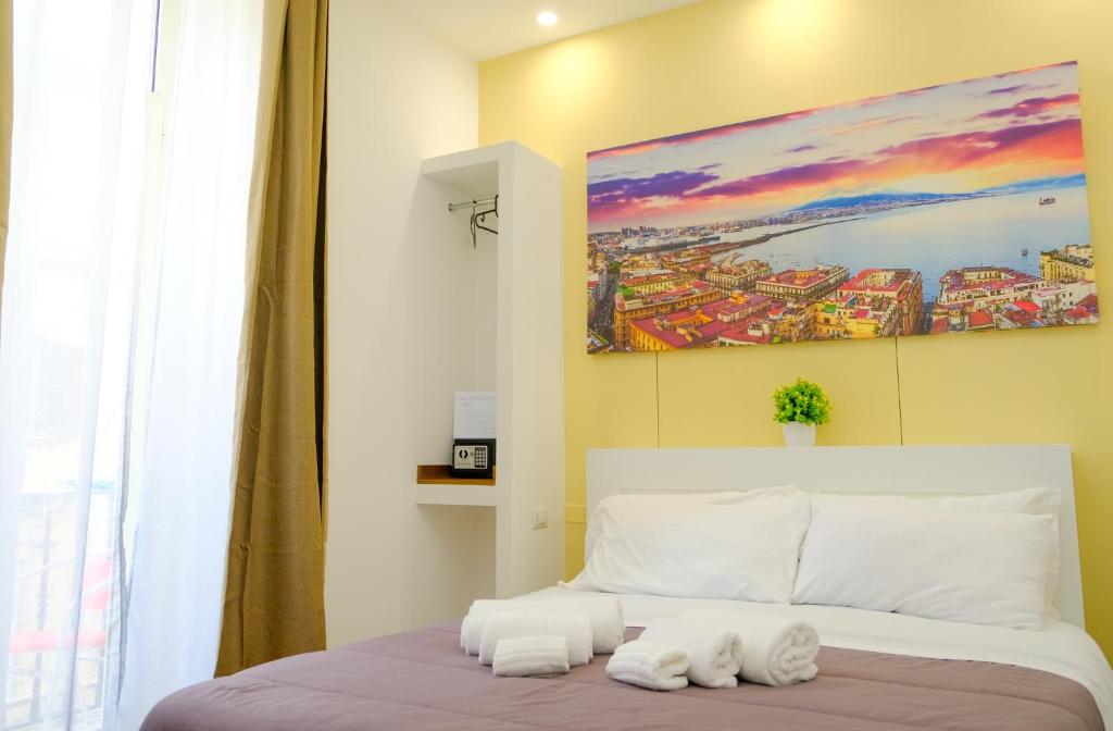 Postel nebo postele na pokoji v ubytování B&b Onda Napoli