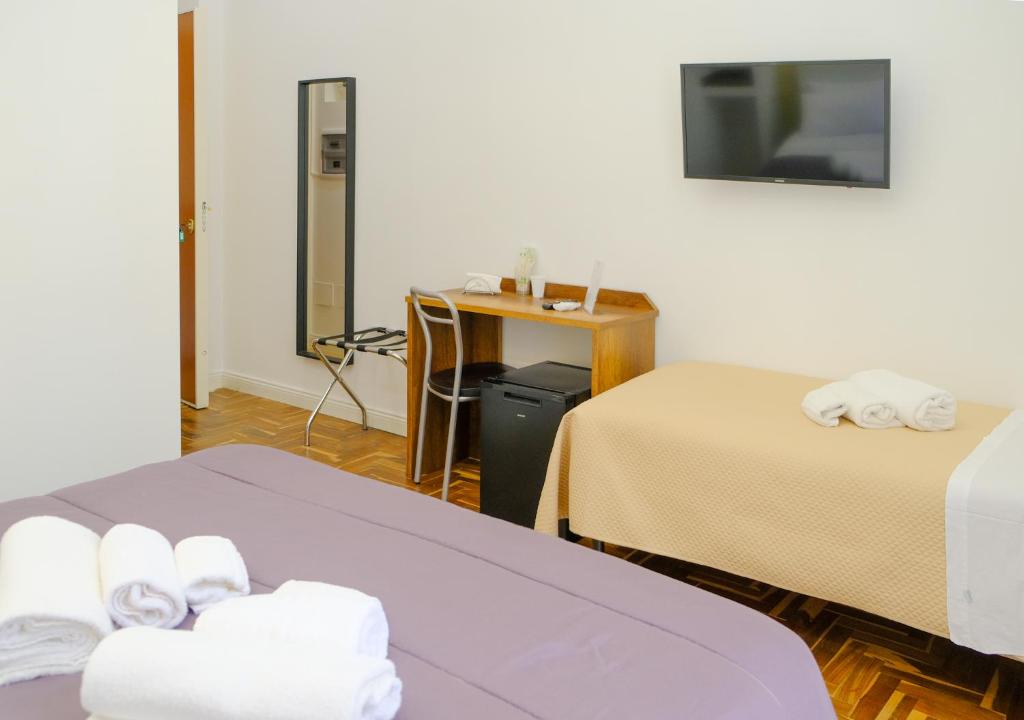 Postel nebo postele na pokoji v ubytování B&b Onda Napoli