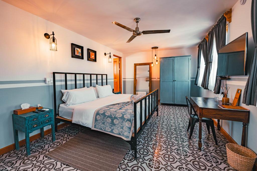 Postel nebo postele na pokoji v ubytování Clandestino Hotel Pila Seca