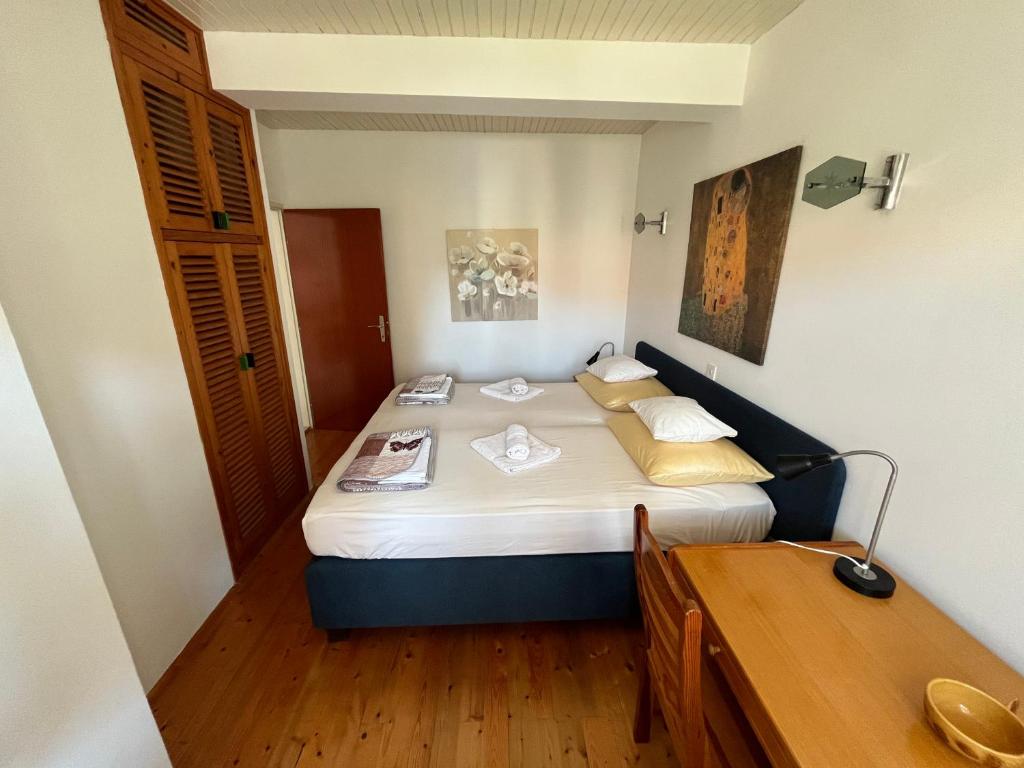 Postel nebo postele na pokoji v ubytování Apartments Šuda