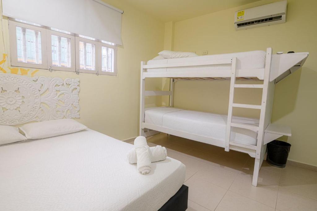 Postel nebo postele na pokoji v ubytování San Felicin Hostel