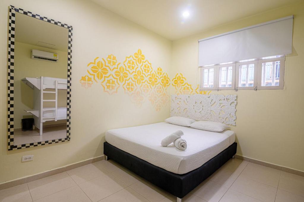 Postel nebo postele na pokoji v ubytování San Felicin Hostel