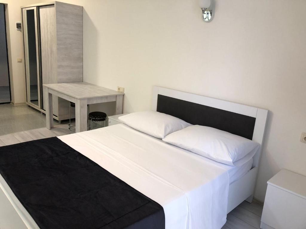 Postel nebo postele na pokoji v ubytování Salami Residence