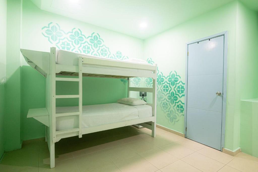 Postel nebo postele na pokoji v ubytování San Felicin Hostel