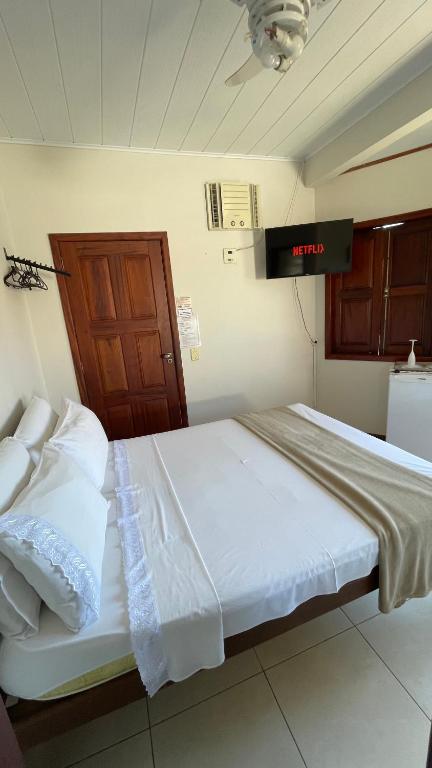 Postel nebo postele na pokoji v ubytování Pousada Brisa do Leste