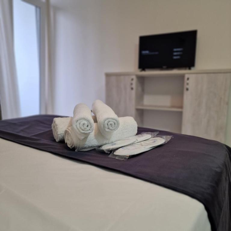 TV a/nebo společenská místnost v ubytování Salami Residence
