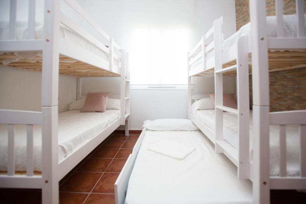 Postel nebo postele na pokoji v ubytování Villa las Raices