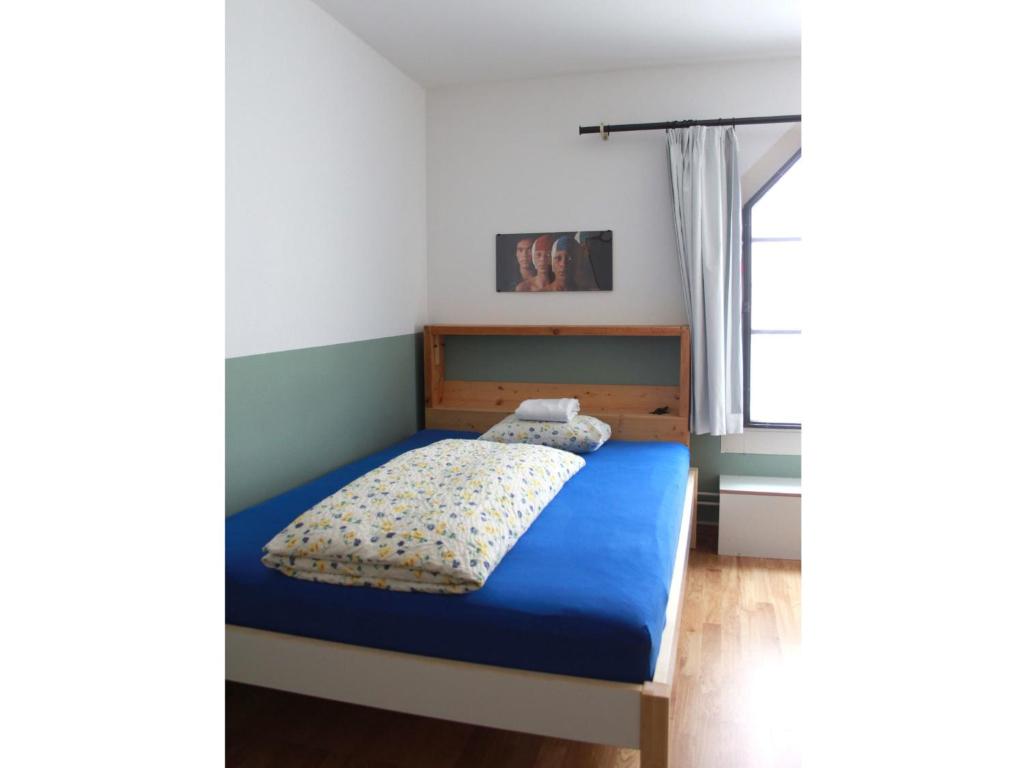 Postel nebo postele na pokoji v ubytování Basel Backpack