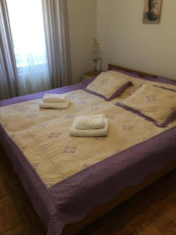 Postel nebo postele na pokoji v ubytování Apartment Juliana