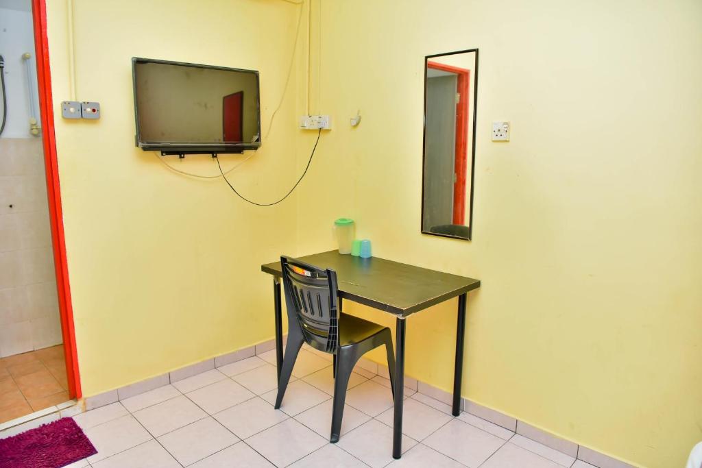 TV a/nebo společenská místnost v ubytování T FAMILY HOTEL